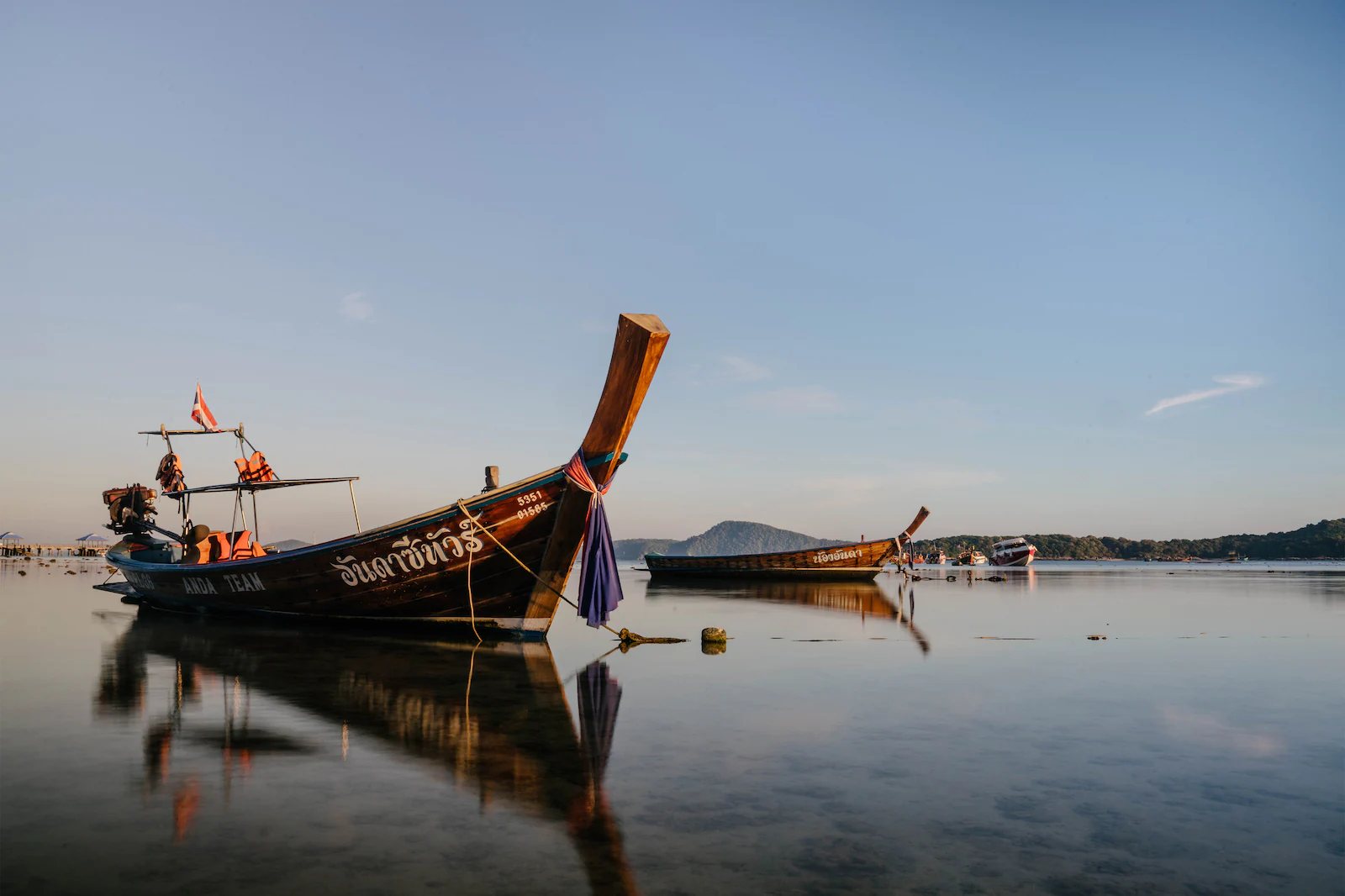 Multiple Sampan boats resting by Phuket sea