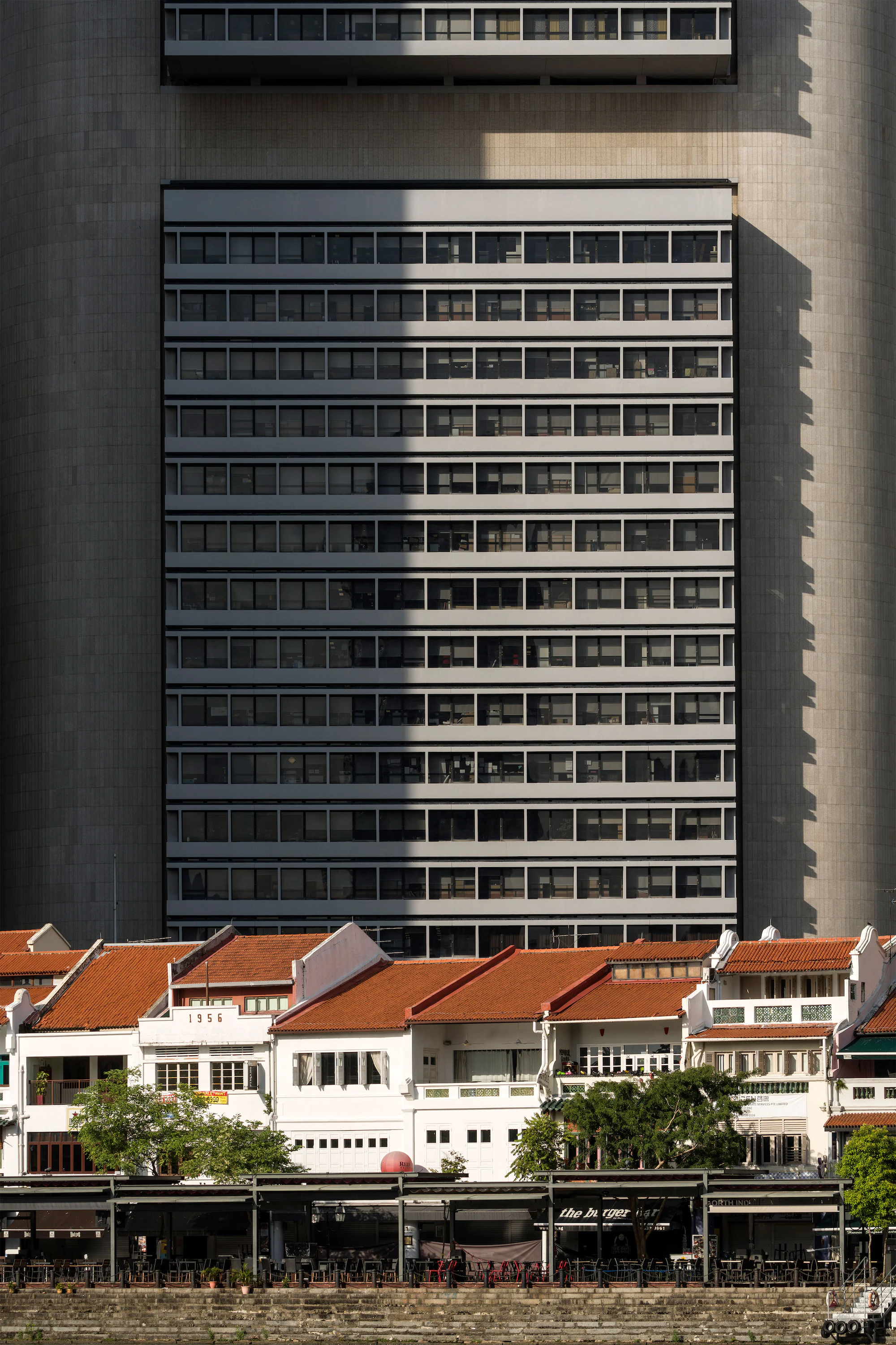 "Sony Alpha 7R IV highlights gradation and texture of building along Boat Quay. Perfect for architectural photograph