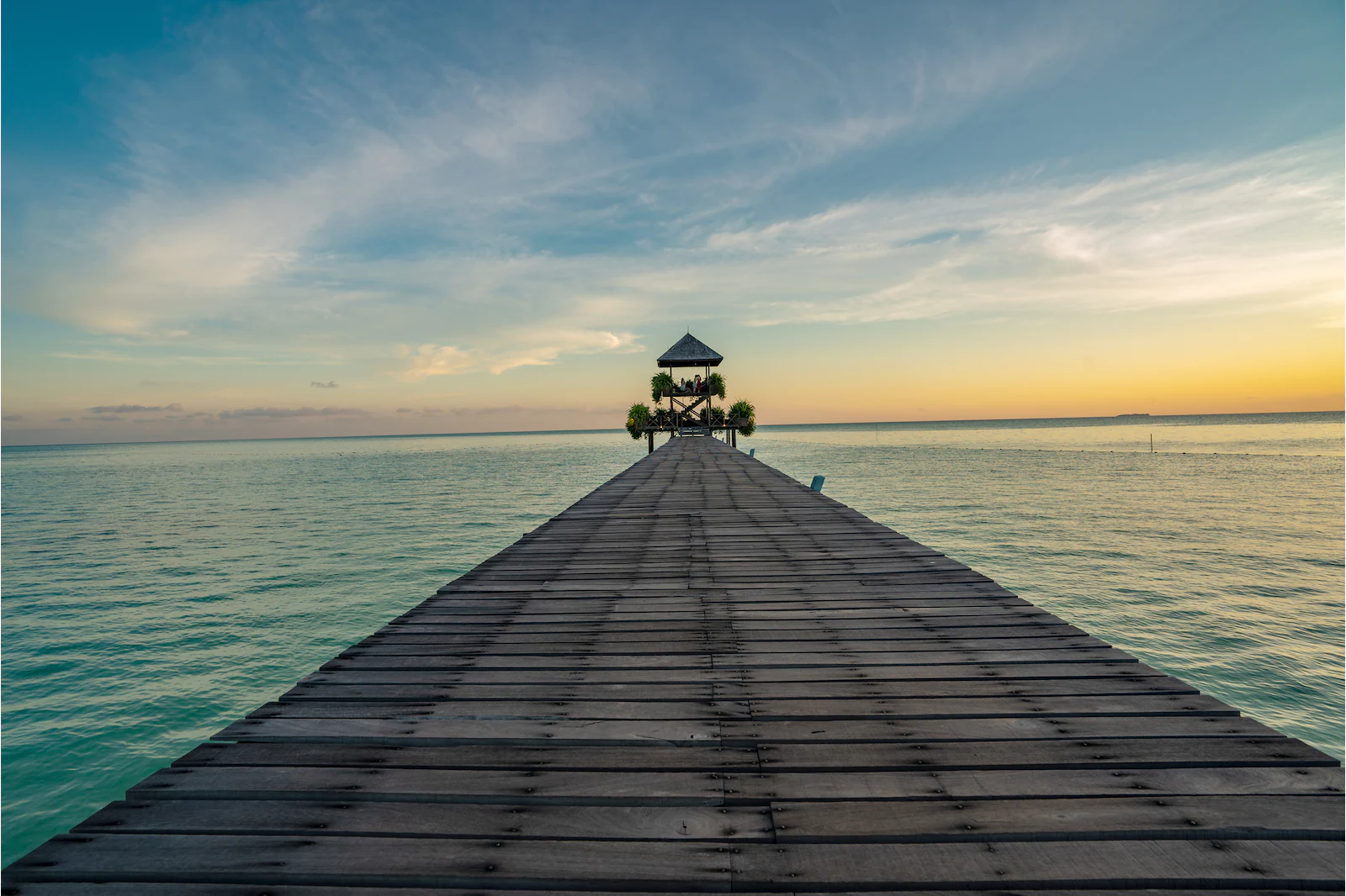 Sunset frontal view of bridge by the sea in Pulau Sipadan