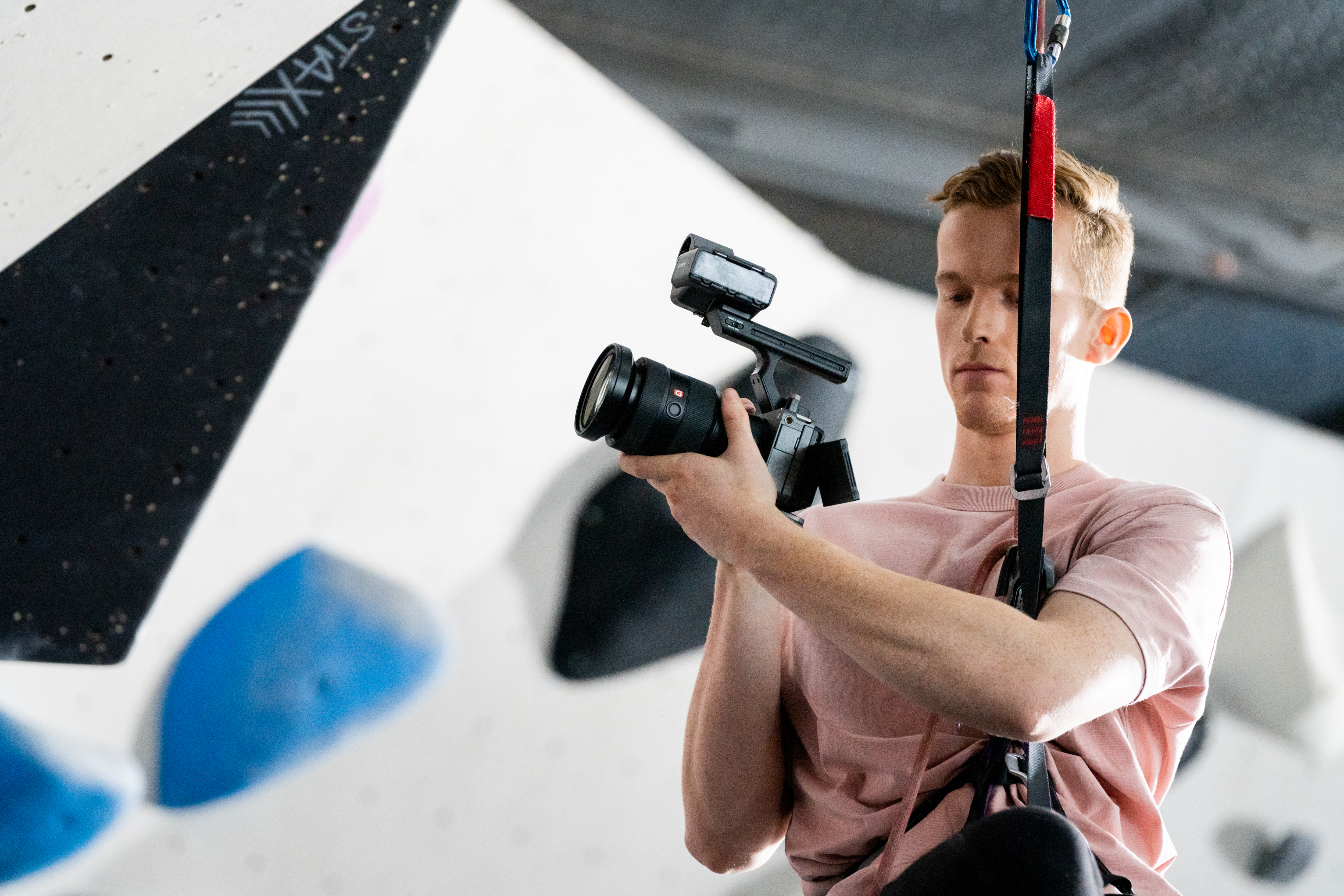 Filming at indoor rock climbing site